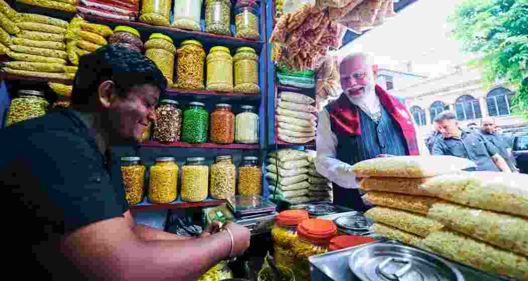 Prime Minister Narendra Modi at the jhalmuri stall during campaigning for the 2026 West Bengal Assembly elections in Jhargram on April 19. (File photo) Prime Minister Narendra Modi at the jhalmuri stall during campaigning for the 2026 West Bengal Assembly elections in Jhargram on April 19. (File photo)
