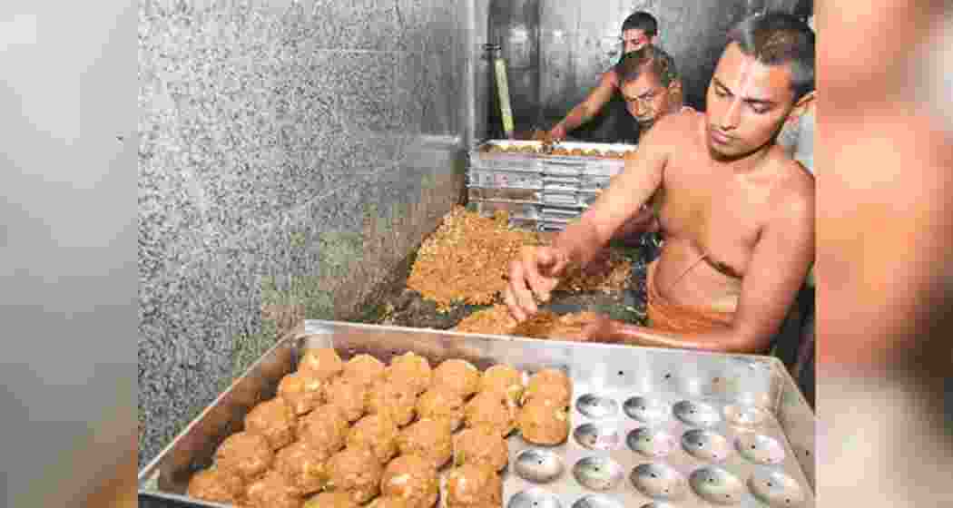 The Tirupati laddu (prasadam) being made. The Tirupati laddu (prasadam) being made.