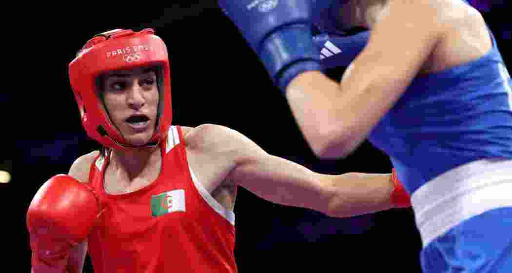 Imane Khelif of Algeria in action against Italian boxer Angela Carini in the women's 66kg category pre-quarter-finals at the Paris Olympics 2024. Imane Khelif of Algeria in action against Italian boxer Angela Carini in the women's 66kg category pre-quarter-finals at the Paris Olympics 2024.