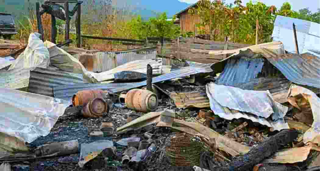 Charred houses stand in Kamjong district after fresh violence near the Indo-Myanmar border forced villagers and Myanmar refugees to flee their homes. (Representative image) Charred houses stand in Kamjong district after fresh violence near the Indo-Myanmar border forced villagers and Myanmar refugees to flee their homes. (Representative image)