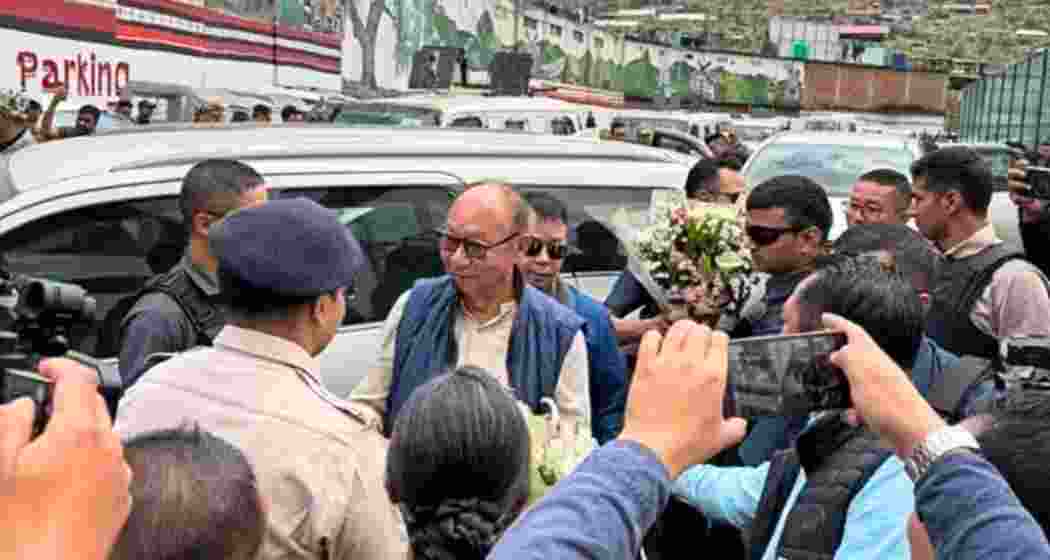 Manipur Chief Minister Yumnam Khemchand interacts with officials after reaching Senapati via NH-2 under tight security. Manipur Chief Minister Yumnam Khemchand interacts with officials after reaching Senapati via NH-2 under tight security.