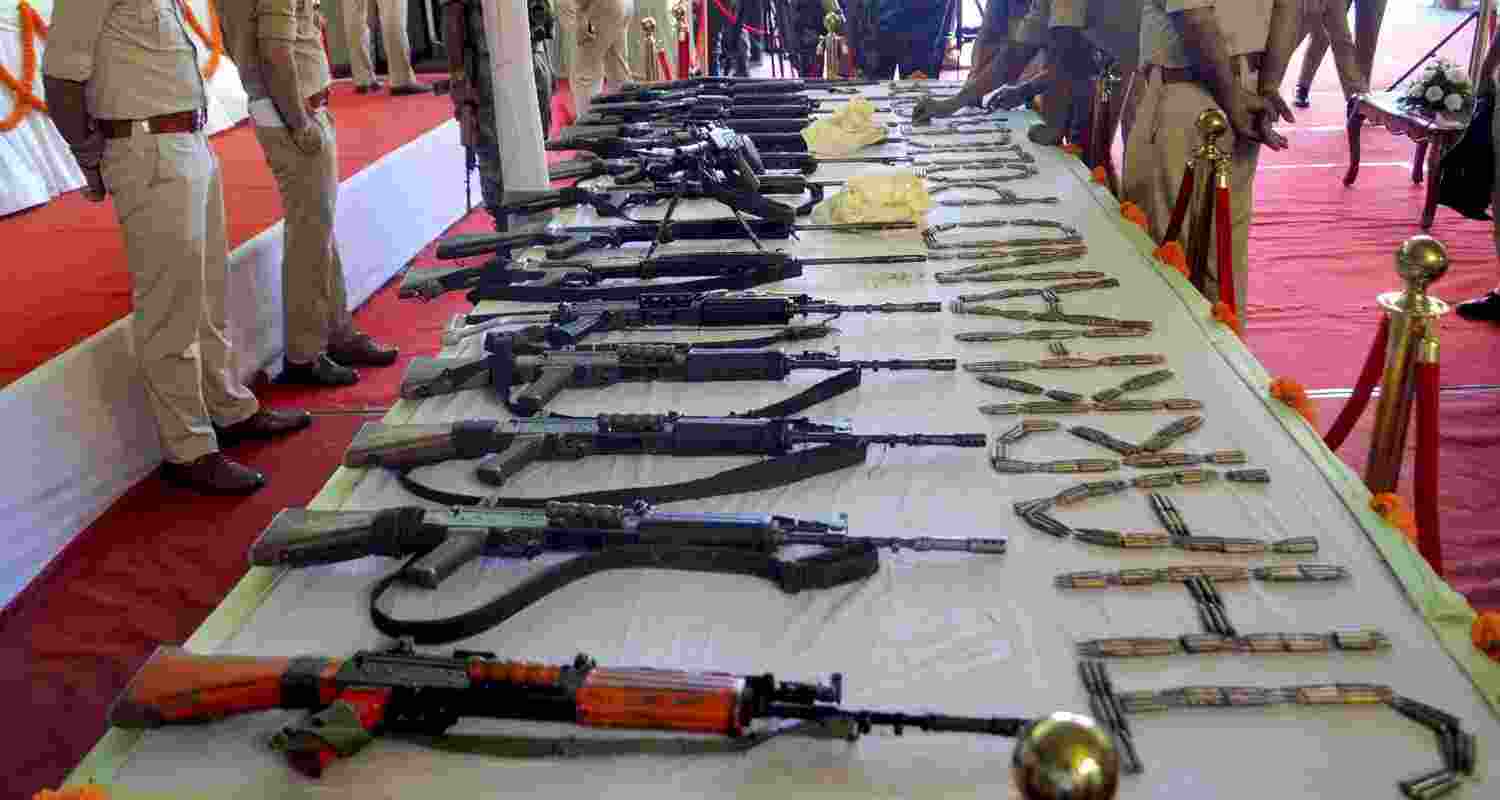Arms and ammunition surrendered by 27 Maoists are displayed during an event after their surrender, in Ranchi, Jharkhand, Thursday, May 21, 2026. Arms and ammunition surrendered by 27 Maoists are displayed during an event after their surrender, in Ranchi, Jharkhand, Thursday, May 21, 2026.