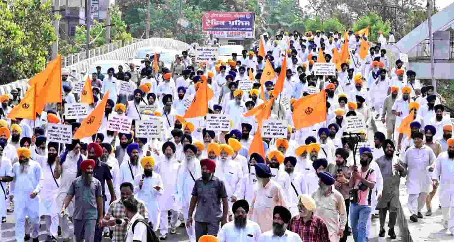 Members of the SGPC take part in a protest march in Amritsar demanding the release of the film Satluj. Members of the SGPC take part in a protest march in Amritsar demanding the release of the film Satluj.