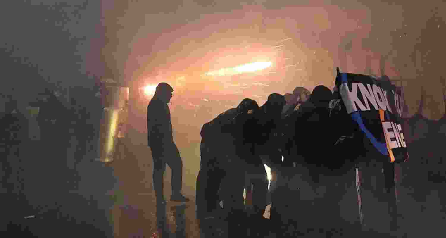 Protesters clashed with police in Milan after the Winter Olympics opening, as activists decried the Games as unsustainable; rail sabotage disrupted services. Protesters clashed with police in Milan after the Winter Olympics opening, as activists decried the Games as unsustainable; rail sabotage disrupted services.