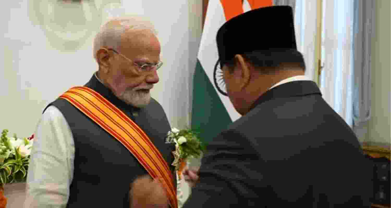 PM Modi conferred Indonesia's highest civilian honour 'Bintang Adipurna' PM Modi conferred Indonesia's highest civilian honour 'Bintang Adipurna'