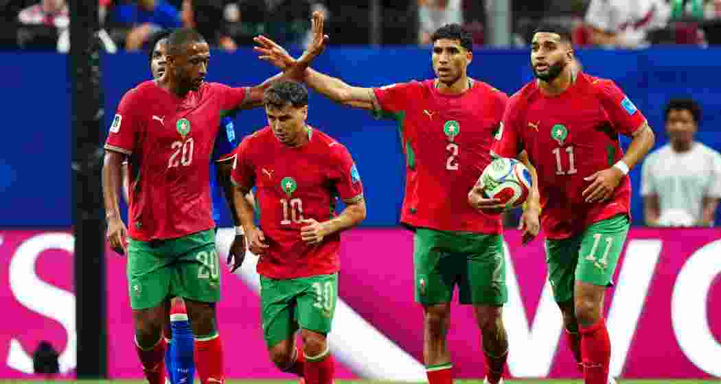 Morocco players celebrate after scoring a goal during a match against Haiti in Atlanta, sealing qualification for the Round of 32 and setting African World Cup records. Morocco players celebrate after scoring a goal during a match against Haiti in Atlanta, sealing qualification for the Round of 32 and setting African World Cup records.