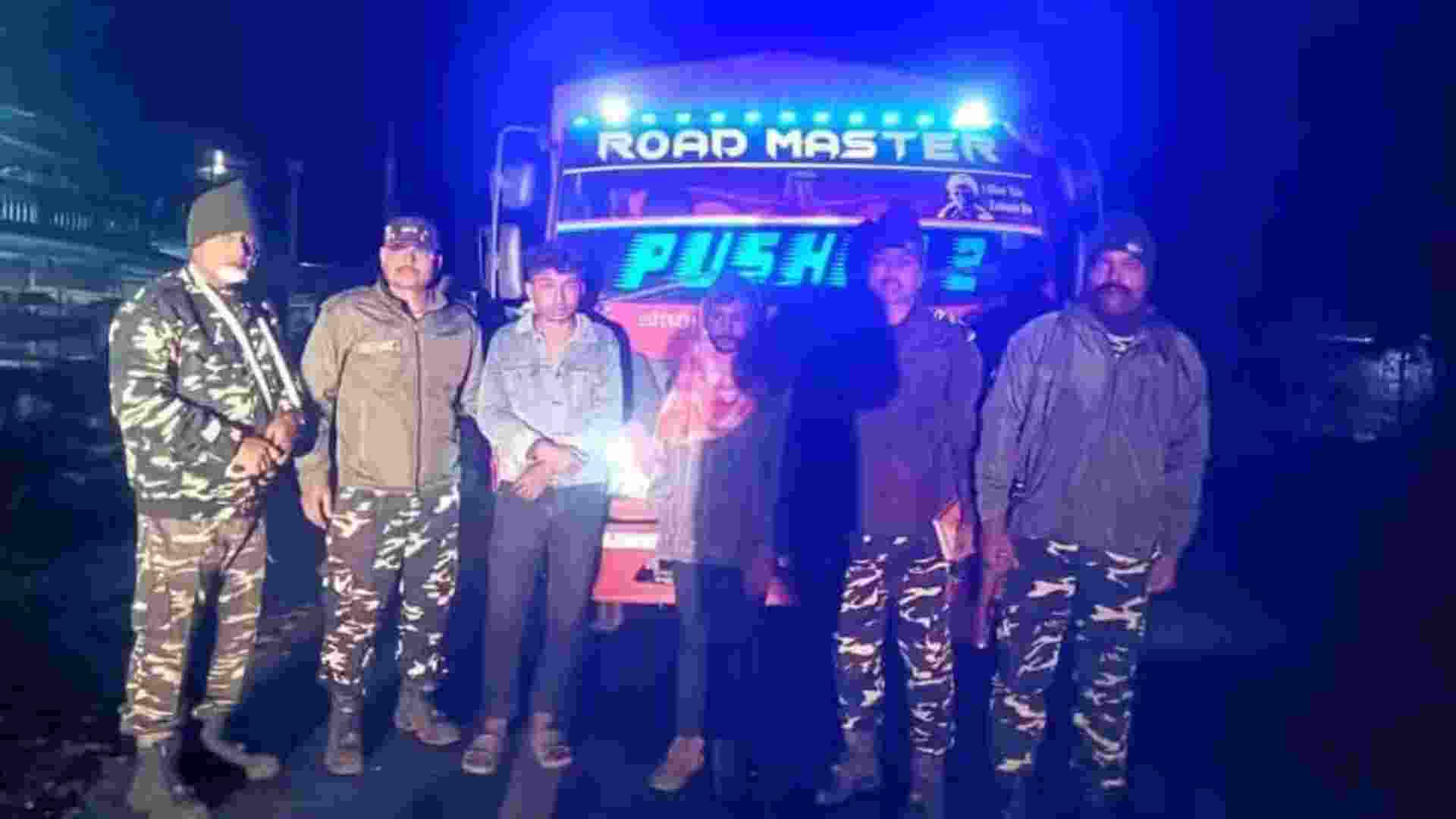 SSB personnel pose with the seized truck and arrested cattle smugglers after a high-speed chase near the India–Nepal border in Naxalbari. SSB personnel pose with the seized truck and arrested cattle smugglers after a high-speed chase near the India–Nepal border in Naxalbari.