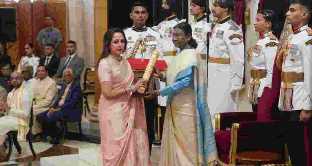President Droupadi Murmu confers the Padma Vibhushan to veteran actor Dharmendra posthumously, received by BJP MP Hema Malini on his behalf, during a Civil Investiture Ceremony, at Rashtrapati Bhavan in New Delhi, on Monday. (PTI Photo/Shahbaz Khan) President Droupadi Murmu confers the Padma Vibhushan to veteran actor Dharmendra posthumously, received by BJP MP Hema Malini on his behalf, during a Civil Investiture Ceremony, at Rashtrapati Bhavan in New Delhi, on Monday. (PTI Photo/Shahbaz Khan)