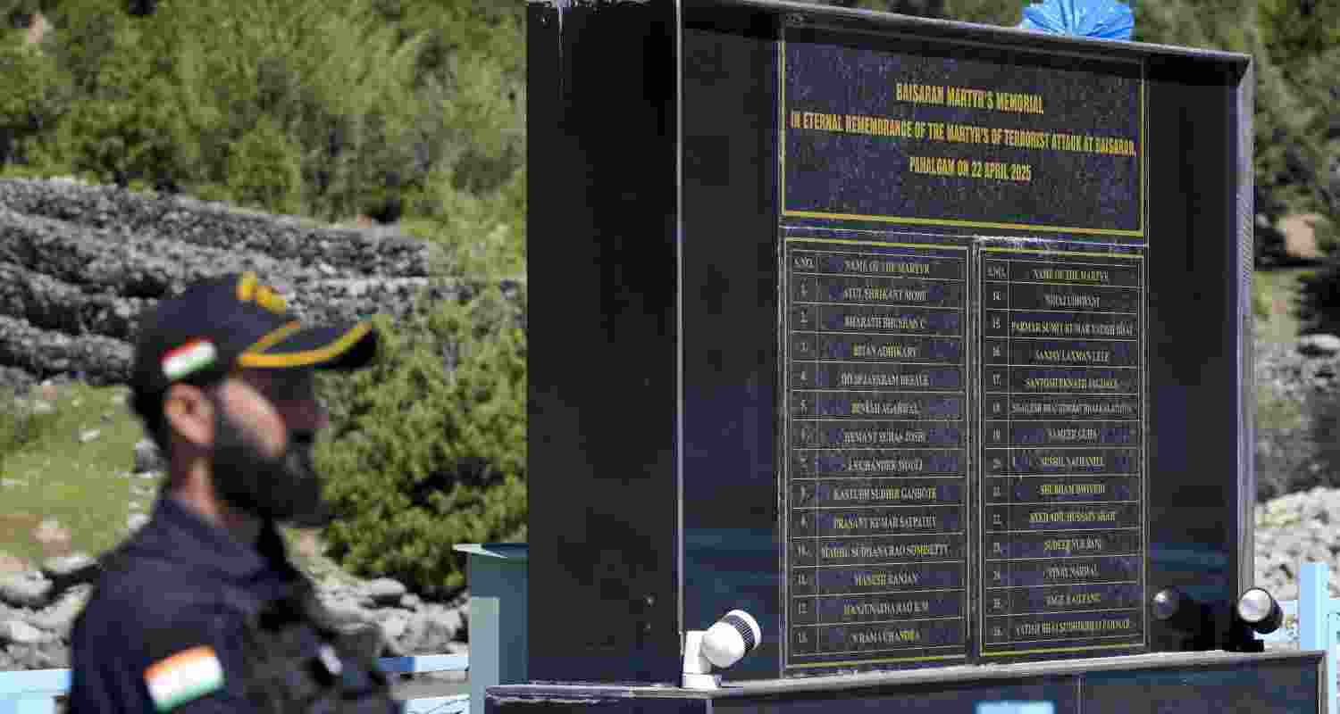 A security personnel keeps vigil near the Baisaran memorial, remembrance of the martyr's of Pahalgam terror attack in which 26 people were shot dead by Lashkar-e-Taiba terrorists, on its first anniversary, at Pahalgam in Anantnag district, Jammu and Kashmir. A security personnel keeps vigil near the Baisaran memorial, remembrance of the martyr's of Pahalgam terror attack in which 26 people were shot dead by Lashkar-e-Taiba terrorists, on its first anniversary, at Pahalgam in Anantnag district, Jammu and Kashmir.