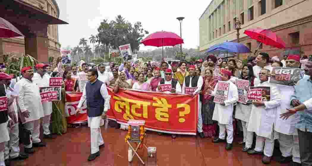Congress MPs Priyanka Gandhi Vadra, Sanjna Jatav, R Sudha, Praniti Shinde, Amarinder Singh Raja Warring, Samajwadi Party MPs Akhilesh Yadav, Awadhesh Prasad, Ram Gopal Yadav, Jaya Bachchan, Dharmendra Yadav and other opposition MPs in a protest seeking a response from the government on police action on student demonstrators and alleged theft of Ayodhya's Ram temple donations during the Monsoon session of Parliament in New Delhi. Congress MPs Priyanka Gandhi Vadra, Sanjna Jatav, R Sudha, Praniti Shinde, Amarinder Singh Raja Warring, Samajwadi Party MPs Akhilesh Yadav, Awadhesh Prasad, Ram Gopal Yadav, Jaya Bachchan, Dharmendra Yadav and other opposition MPs in a protest seeking a response from the government on police action on student demonstrators and alleged theft of Ayodhya's Ram temple donations during the Monsoon session of Parliament in New Delhi.