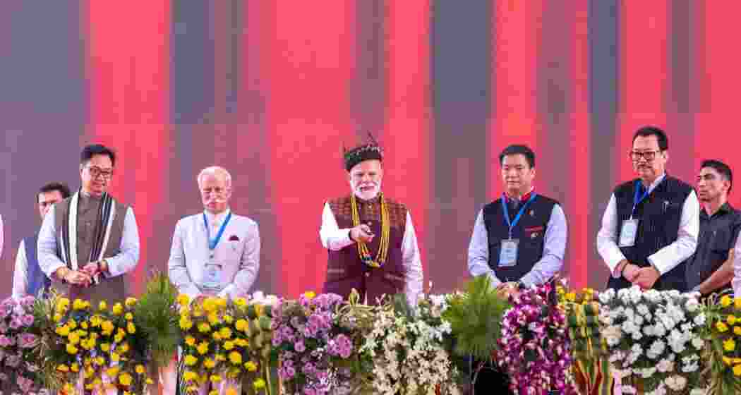 Prime Minister Narendra Modi with Kiren Rijiju, Pema Khandu, Arunachal Governor and officials during the inauguration ceremony in Itanagar on Monday. Prime Minister Narendra Modi with Kiren Rijiju, Pema Khandu, Arunachal Governor and officials during the inauguration ceremony in Itanagar on Monday.