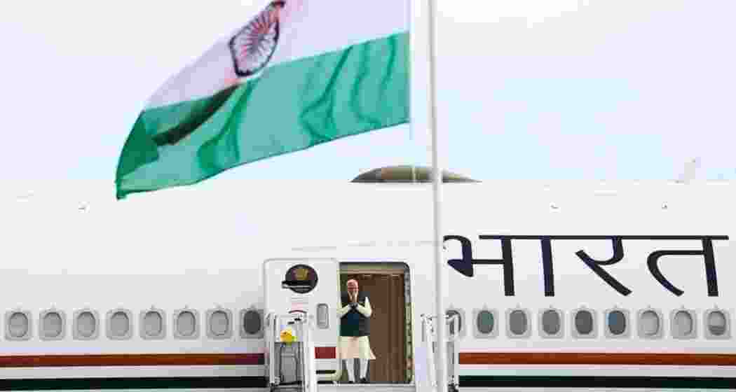 Prime Minister Narendra Modi deboards from his aircraft during his five-nation Europe and Gulf tour covering the UAE, the Netherlands, Sweden, Norway and Italy. Prime Minister Narendra Modi deboards from his aircraft during his five-nation Europe and Gulf tour covering the UAE, the Netherlands, Sweden, Norway and Italy.