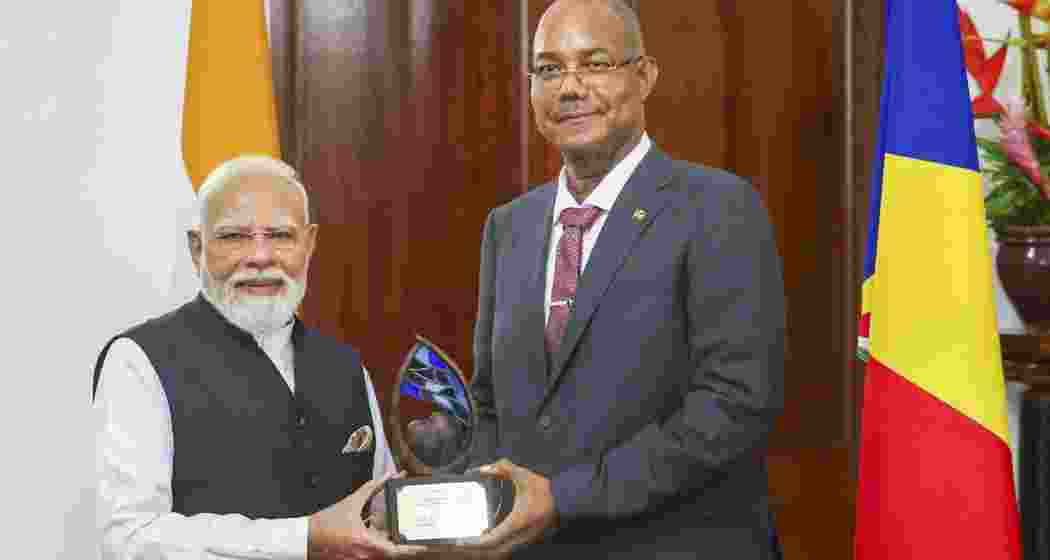 Prime Minister Narendra Modi receives the 'Guardian of the Blue Horizon' from Seychelles President Patrick Herminie, in Seychelles. Prime Minister Narendra Modi receives the 'Guardian of the Blue Horizon' from Seychelles President Patrick Herminie, in Seychelles.