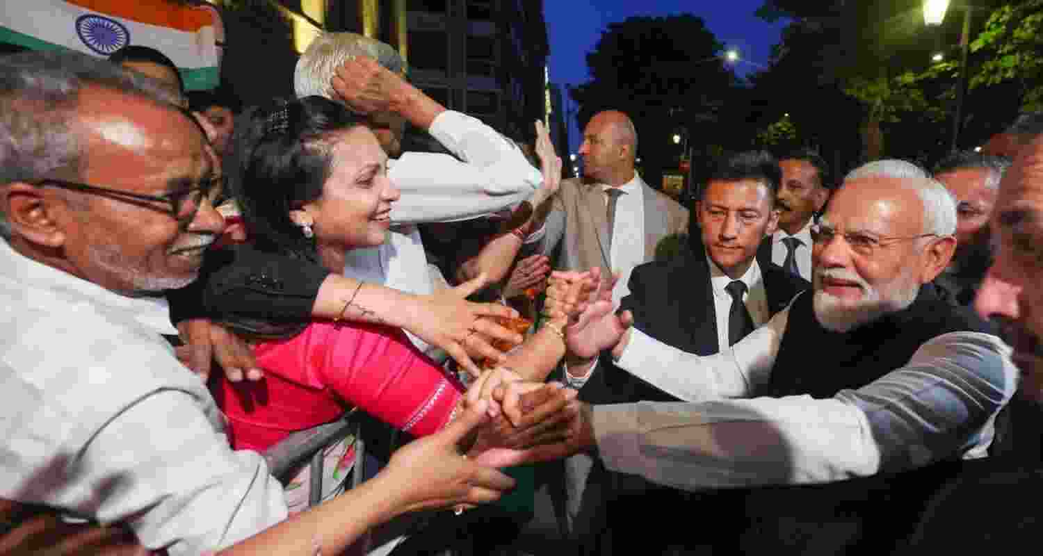 Prime Minister Narendra Modi arrived in Paris following his participation in the G7 Summit held in Evian, France. Upon reaching his hotel in the French capital, he was greeted by an enthusiastic gathering of the Indian diaspora. Prime Minister Narendra Modi arrived in Paris following his participation in the G7 Summit held in Evian, France. Upon reaching his hotel in the French capital, he was greeted by an enthusiastic gathering of the Indian diaspora.
