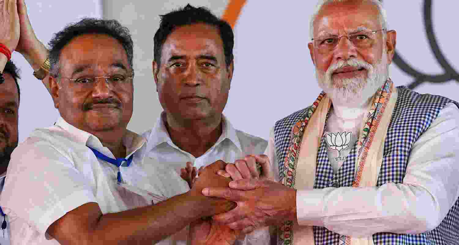 Samik Bhattacharya with PM Modi. Samik Bhattacharya with PM Modi.