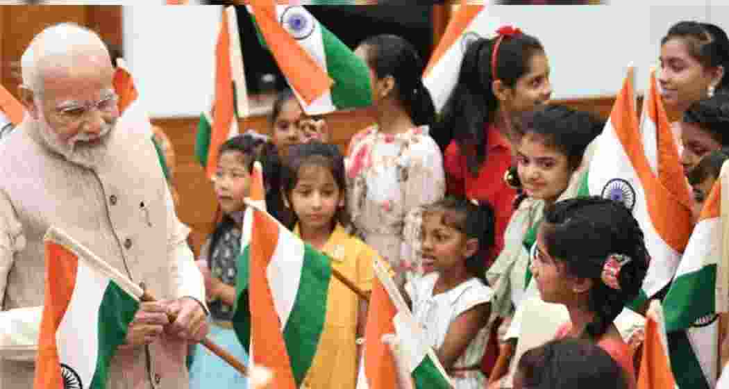 PM shares joyful moments with children.
PM shares joyful moments with children.