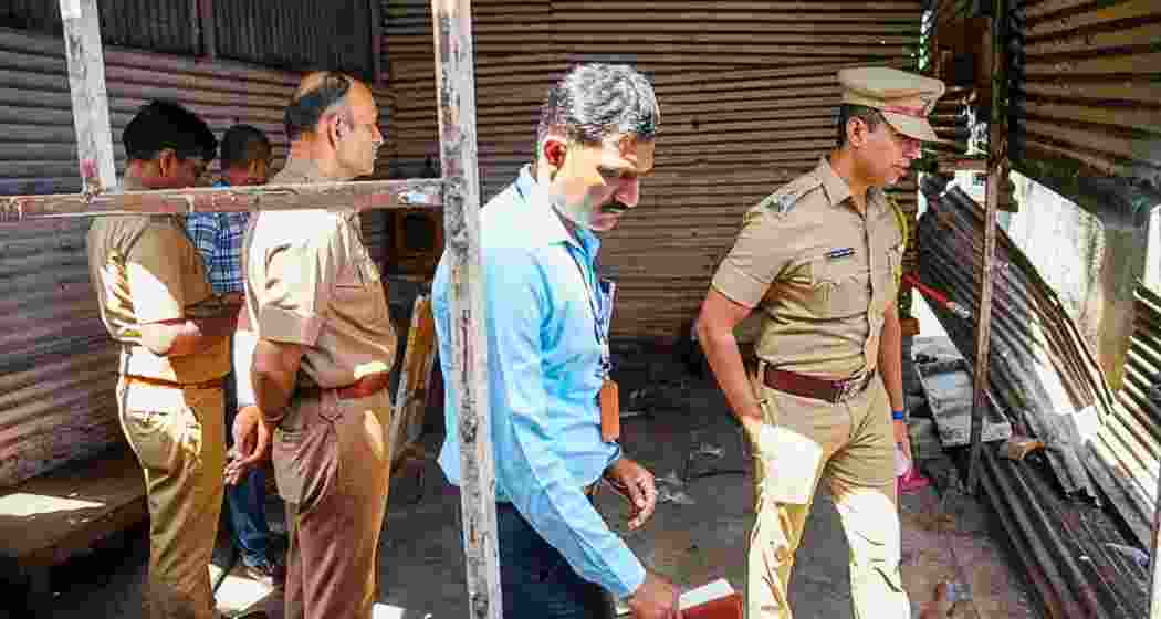 A police team at Hadapsar where at least four people died after consuming spurious liquor, on Friday. (Arul Horizon)
A police team at Hadapsar where at least four people died after consuming spurious liquor, on Friday. (Arul Horizon)