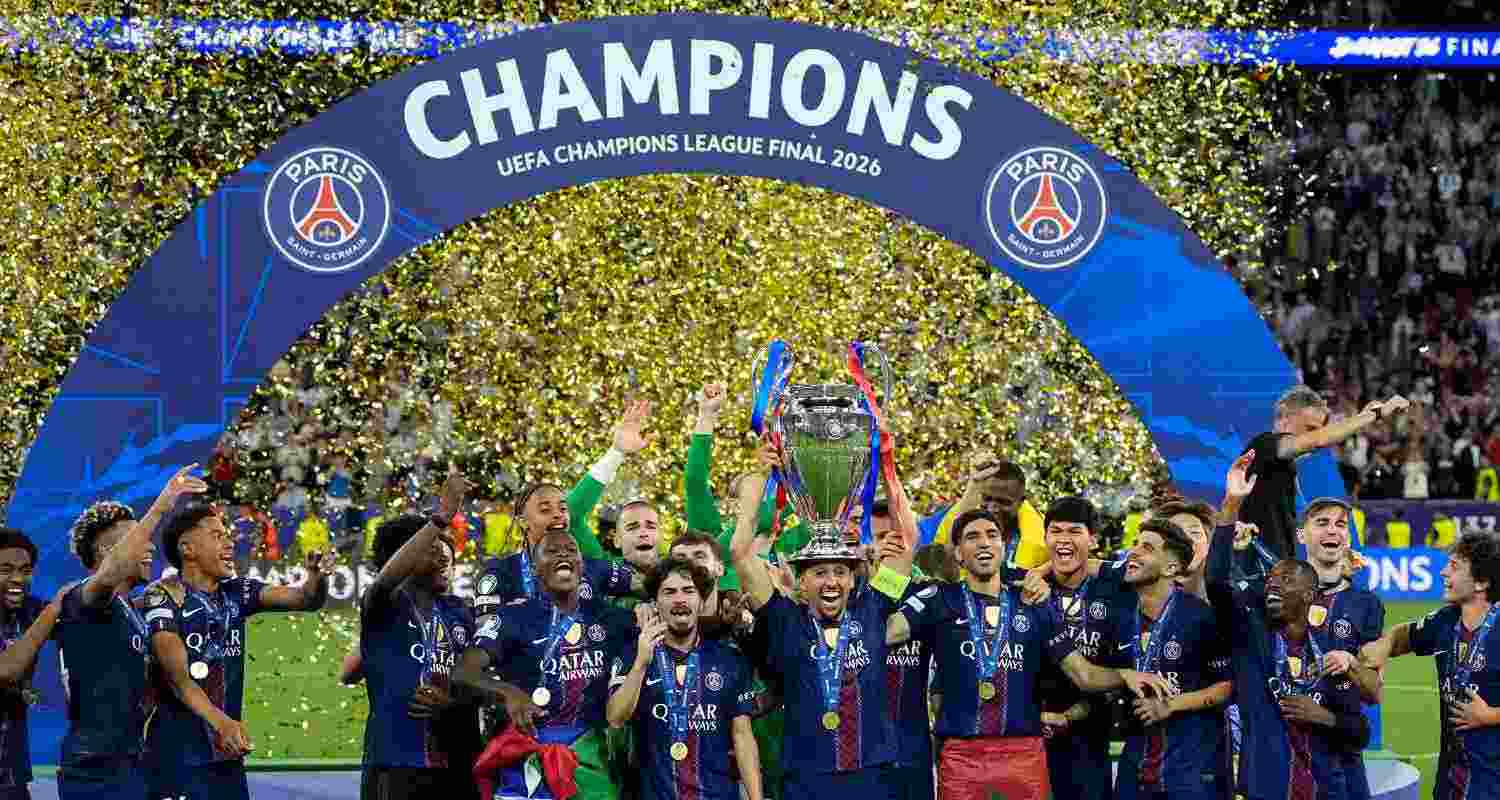 PSG's Marquinhos lifts the trophy celebrating after winning the Champions League final soccer match between Paris Saint-Germain and Arsenal in Budapest, Hungary, Saturday, May 30, 2026. PSG's Marquinhos lifts the trophy celebrating after winning the Champions League final soccer match between Paris Saint-Germain and Arsenal in Budapest, Hungary, Saturday, May 30, 2026.
