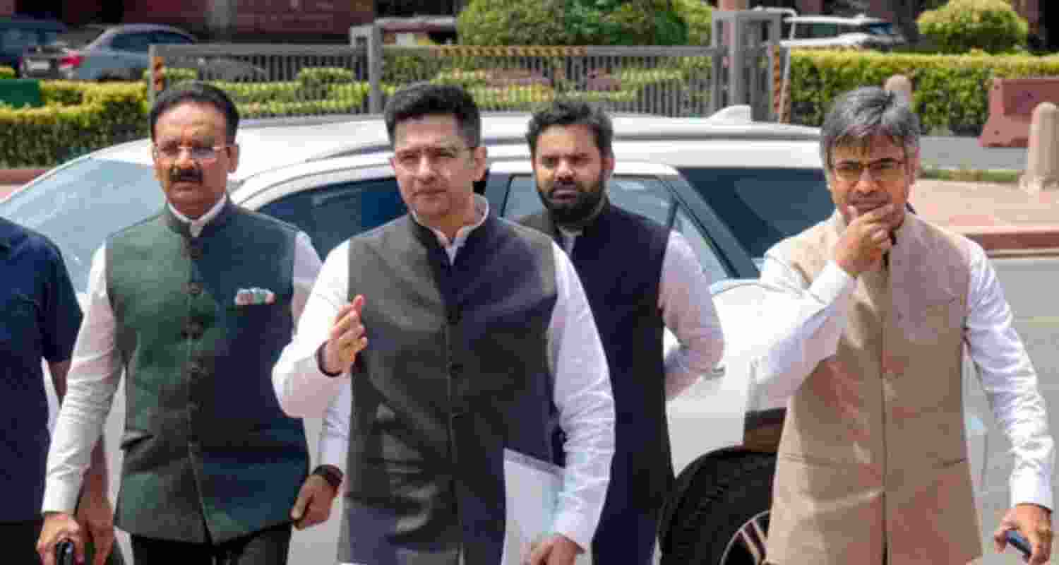 Rajya Sabha MPs Raghav Chadha (front), Sandeep Pathak (right) and Ashok Mittal leave after meeting President Droupadi Murmu in New Delhi on Tuesday. Rajya Sabha MPs Raghav Chadha (front), Sandeep Pathak (right) and Ashok Mittal leave after meeting President Droupadi Murmu in New Delhi on Tuesday.