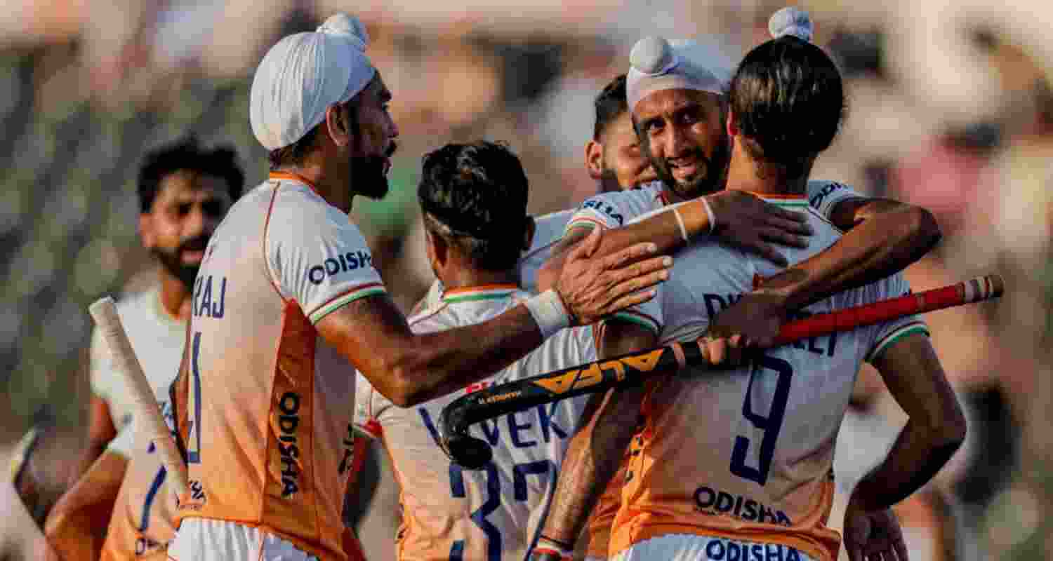 Indian players celebrating a regulation time goal in their match against England. Indian players celebrating a regulation time goal in their match against England.