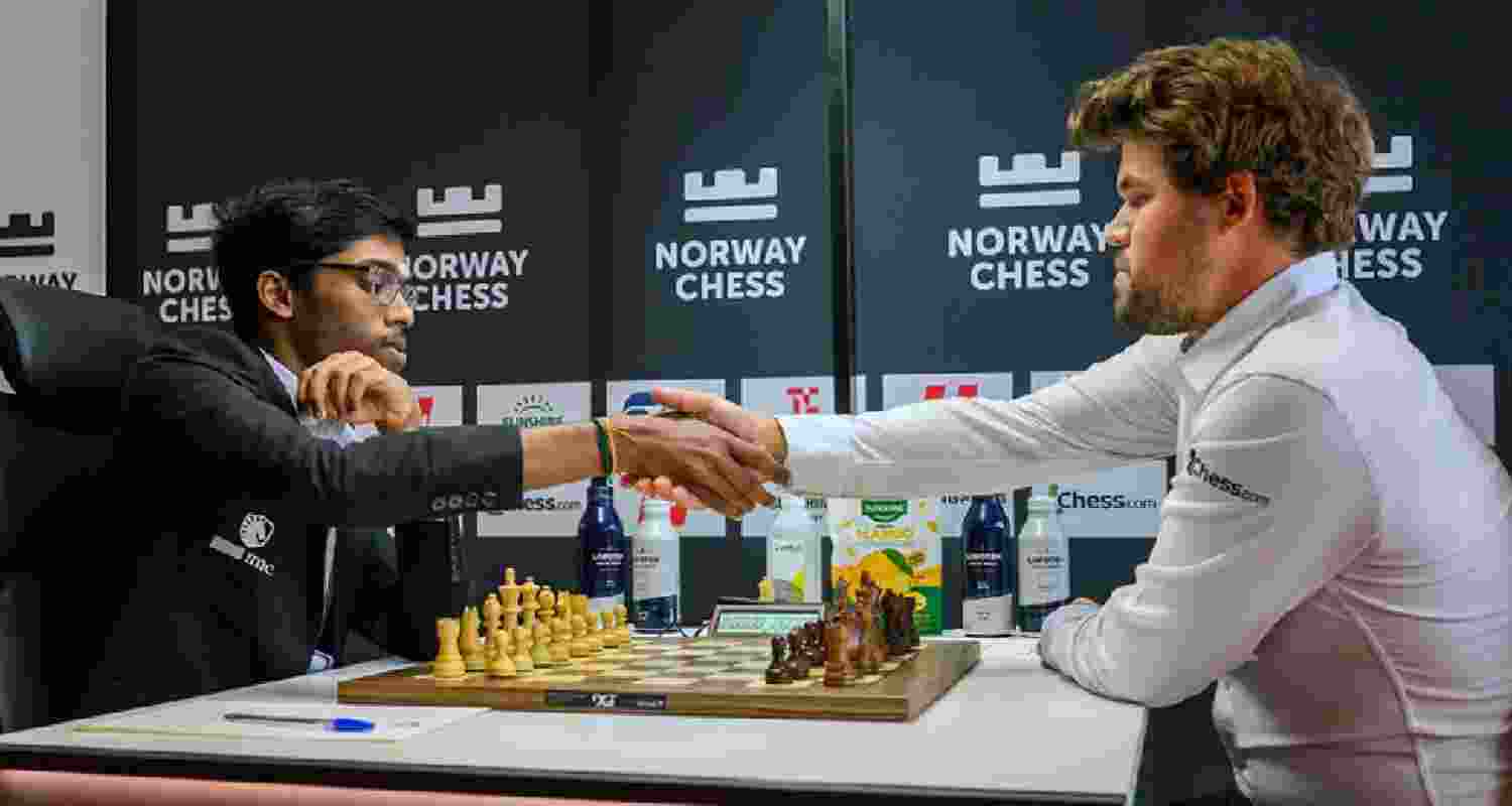 R Praggnanandhaa shaking hands with Magnus Carlsen after defeating the World No. 1 in Round 3 of the Norway Chess tournament. R Praggnanandhaa shaking hands with Magnus Carlsen after defeating the World No. 1 in Round 3 of the Norway Chess tournament.