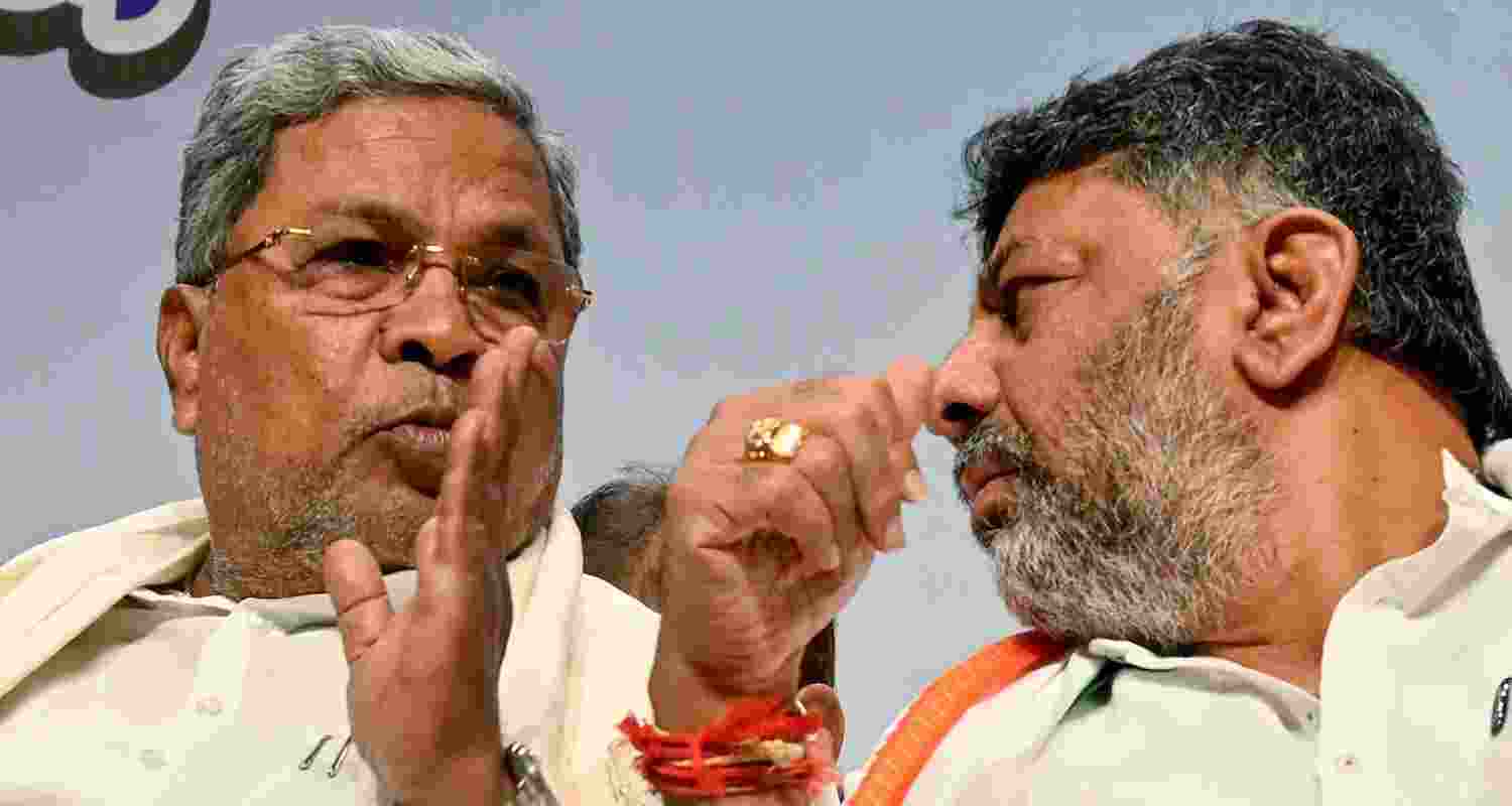 Karnataka chief minister-designate DK Shivakumar (right) with incumbent Siddaramaiah. Karnataka chief minister-designate DK Shivakumar (right) with incumbent Siddaramaiah.