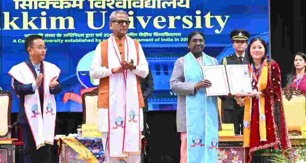 President Droupadi Murmu felicitates a student during the Sikkim University convocation in Gangtok, where Sikkim was officially declared a fully literate state under the Centre’s ULLAS programme. President Droupadi Murmu felicitates a student during the Sikkim University convocation in Gangtok, where Sikkim was officially declared a fully literate state under the Centre’s ULLAS programme.