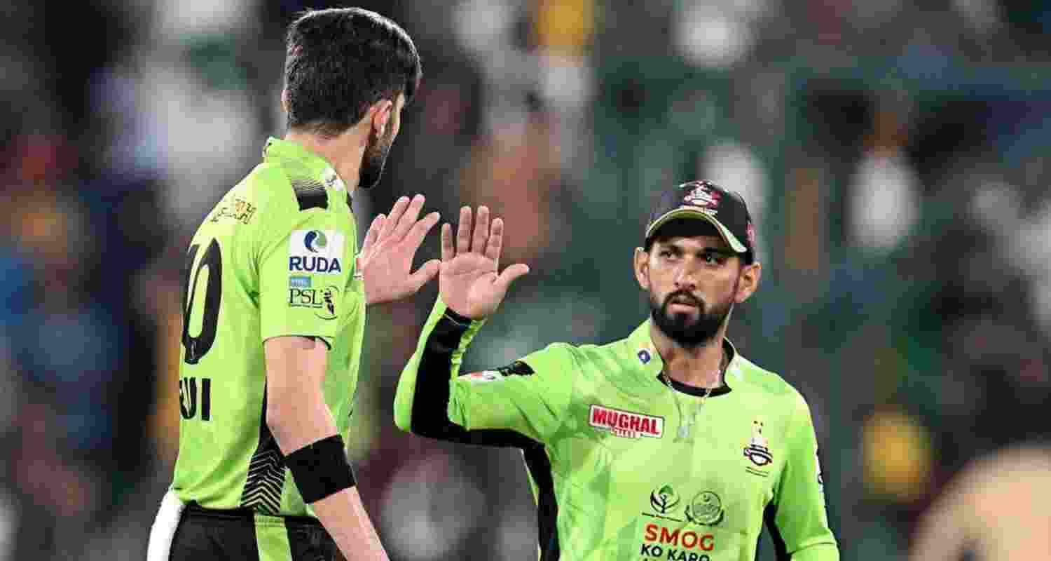 Lahore Qalandars captain Shaheen Shah Afridi with a player of his team. Lahore Qalandars captain Shaheen Shah Afridi with a player of his team.