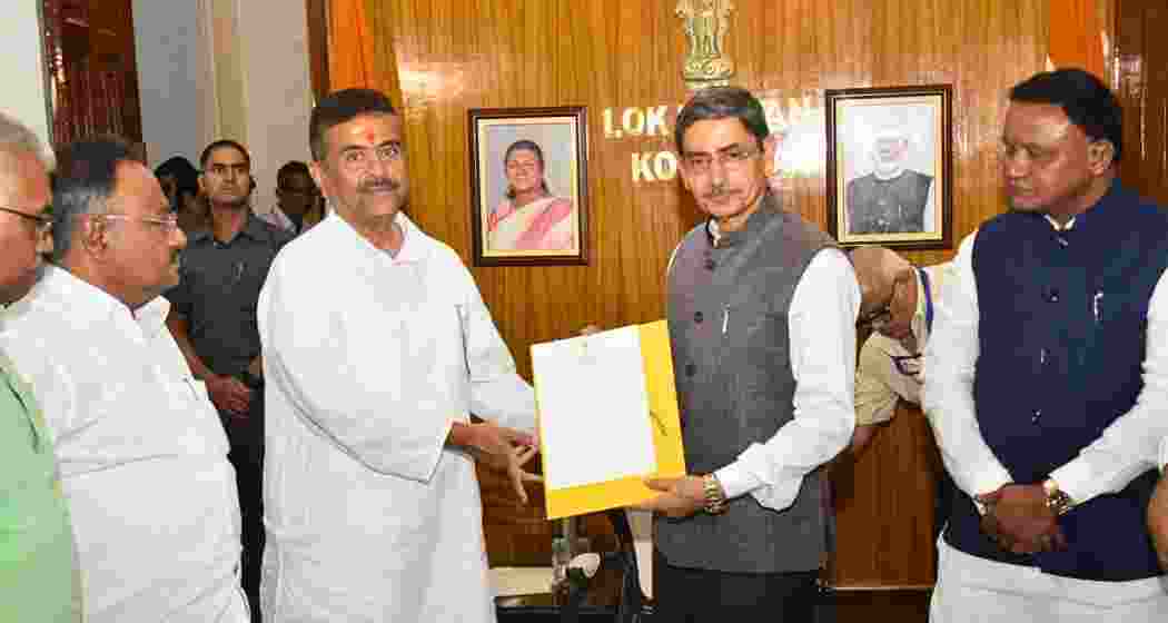 BJP leader Suvendu Adhikari meets Governor RN Ravi at Raj Bhavan in Kolkata after staking claim to form government in West Bengal on Friday. BJP leader Suvendu Adhikari meets Governor RN Ravi at Raj Bhavan in Kolkata after staking claim to form government in West Bengal on Friday.