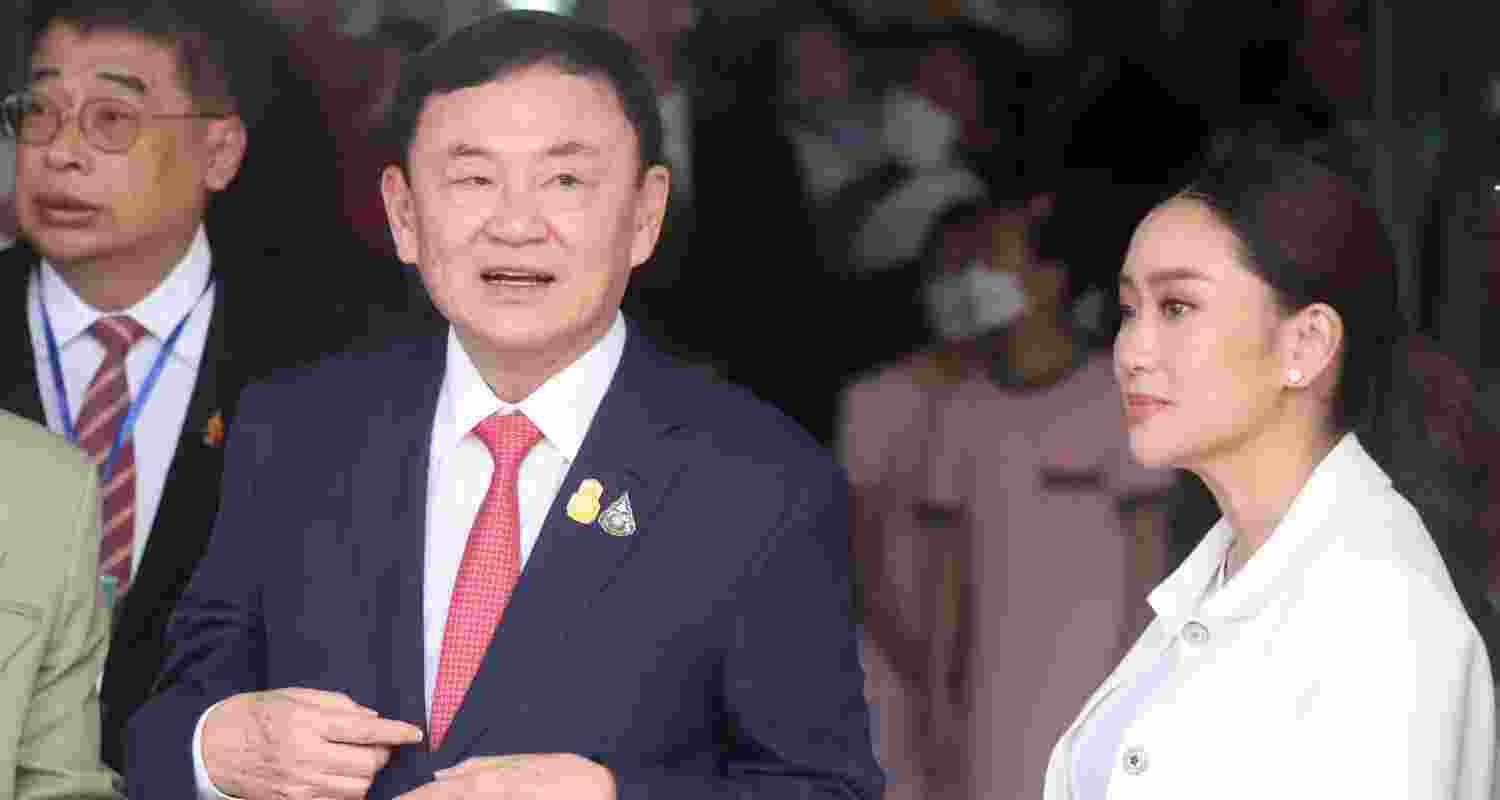 Thaksin Shinawatra and his daughter Paetongtarn Shinawatra. Thaksin Shinawatra and his daughter Paetongtarn Shinawatra.