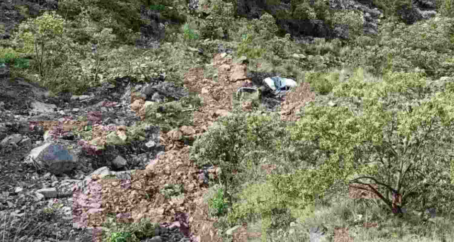 The wreckage of an Innova taxi lies in a gorge after a fatal road accident on the Chamba-Pathankot highway. The wreckage of an Innova taxi lies in a gorge after a fatal road accident on the Chamba-Pathankot highway.
