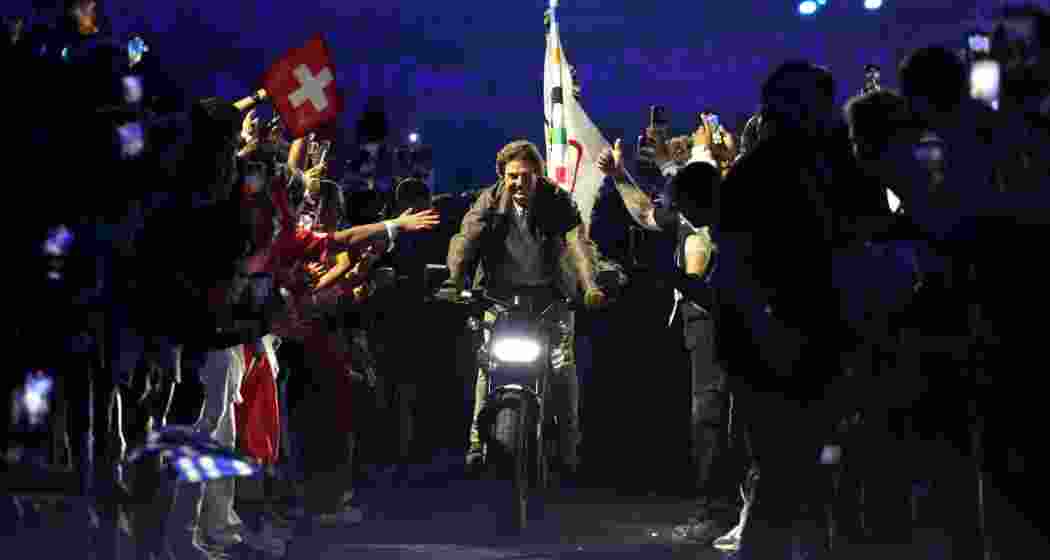 Tom Cruise takes center stage at the Paris Olympics closing ceremony, transferring the Olympic flag to Los Angeles in a dramatic Mission Impossible-style stunt. Tom Cruise takes center stage at the Paris Olympics closing ceremony, transferring the Olympic flag to Los Angeles in a dramatic Mission Impossible-style stunt.