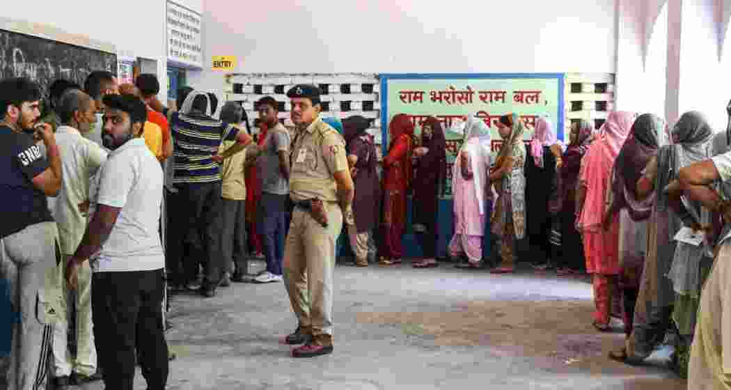 Haryana assembly elections: Voters in queues to cast their vote at a polling station in Panchkula on Saturday. Haryana assembly elections: Voters in queues to cast their vote at a polling station in Panchkula on Saturday.