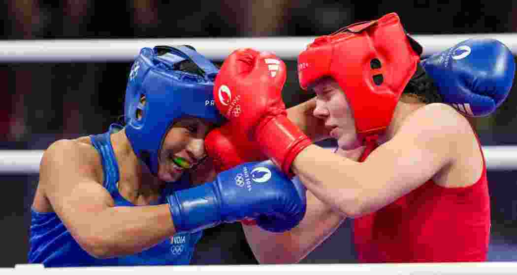 Paris: India's Lovlina Borgohain (in blue) and Norway's Sunniva Hofstad during their women's 75kg Round of 16 boxing match at the 2024 Summer Olympics, in Paris, France, Wednesday. Paris: India's Lovlina Borgohain (in blue) and Norway's Sunniva Hofstad during their women's 75kg Round of 16 boxing match at the 2024 Summer Olympics, in Paris, France, Wednesday.