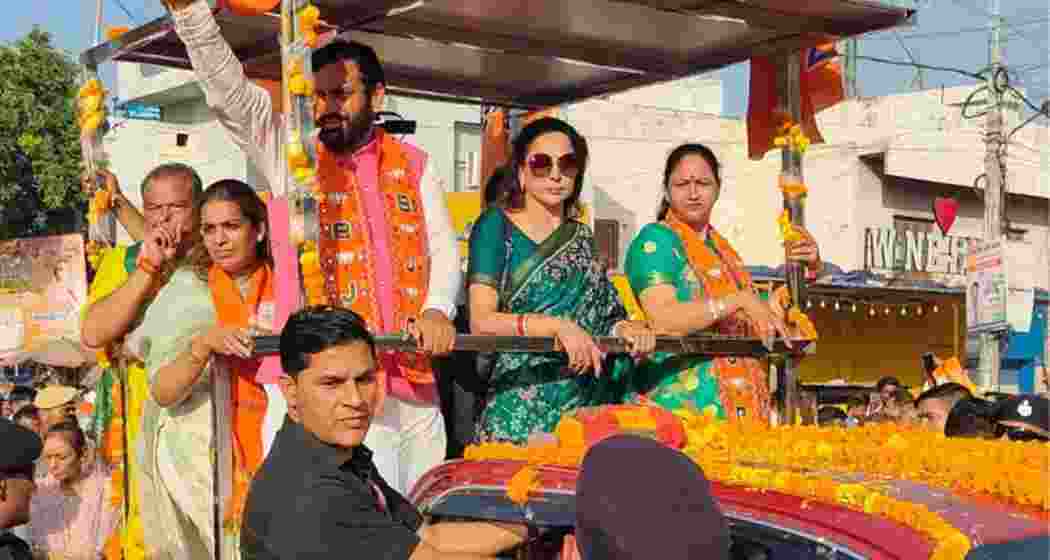 CM Saini, Hema Malini, and his wife hold a roadshow in Ladwa, Haryana. File Photo. CM Saini, Hema Malini, and his wife hold a roadshow in Ladwa, Haryana. File Photo.