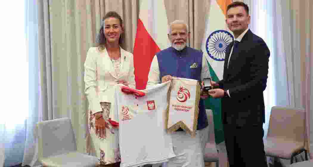 Prime Minister Narendra Modi during a meeting with Kabaddi players Michal Spiczko and Anna Kalbarczyk, in Warsaw, Poland, Thursday, Aug. 22, 2024. Prime Minister Narendra Modi during a meeting with Kabaddi players Michal Spiczko and Anna Kalbarczyk, in Warsaw, Poland, Thursday, Aug. 22, 2024.