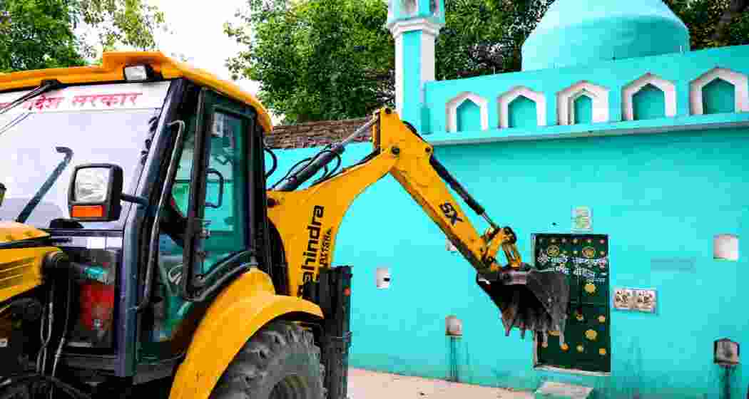A bulldozer demolish a mosque in Uttar Pradesh's Sambhal district on Saturday as part of the state government's anti-encroachment and eviction drive targeting structures allegedly built on government land. A bulldozer demolish a mosque in Uttar Pradesh's Sambhal district on Saturday as part of the state government's anti-encroachment and eviction drive targeting structures allegedly built on government land.
