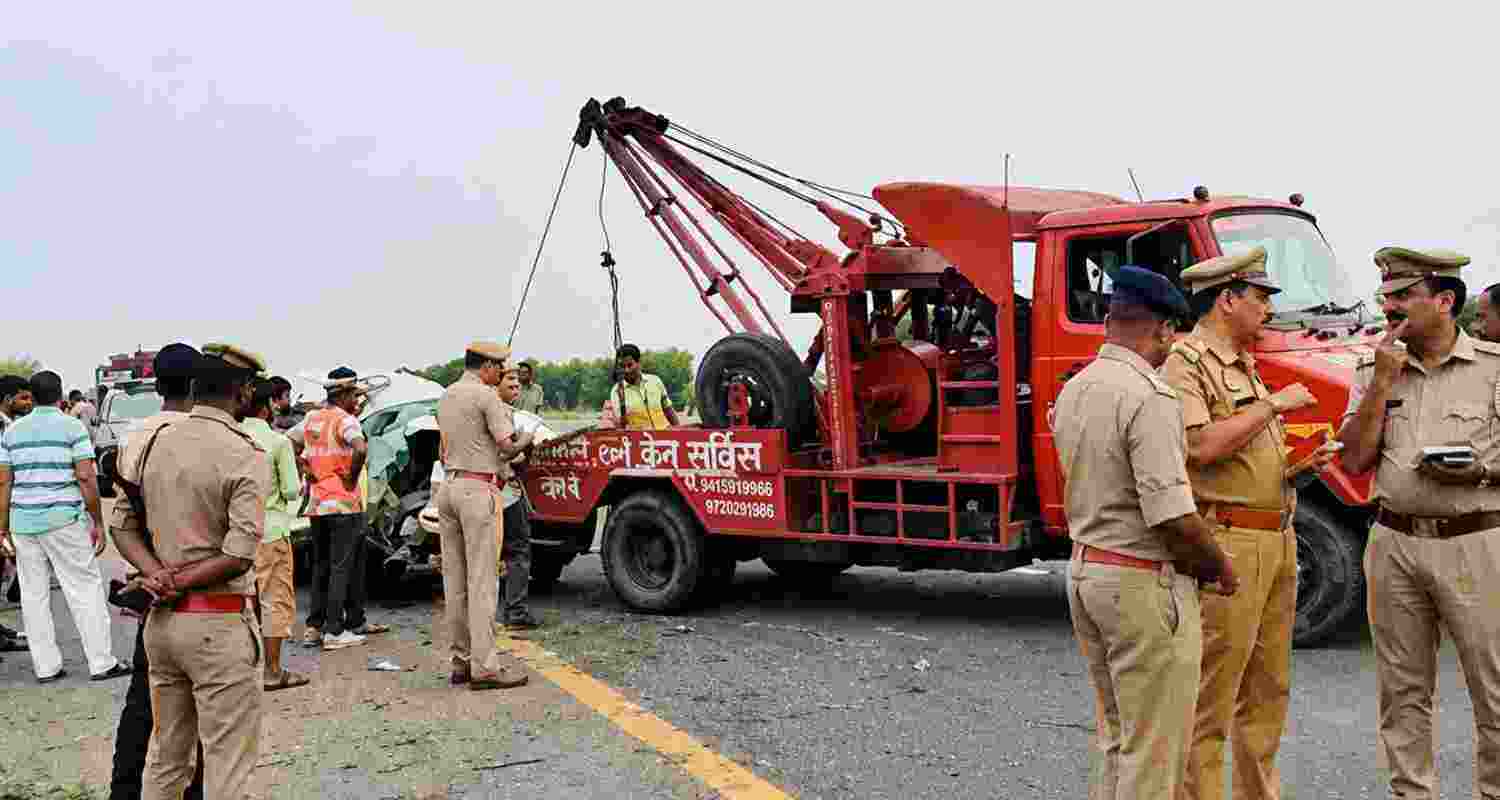 Five people, including two children, were killed and eight injured after a sleeper bus collided with a car and fell off the Agra-Lucknow Expressway in Unnao. Five people, including two children, were killed and eight injured after a sleeper bus collided with a car and fell off the Agra-Lucknow Expressway in Unnao.