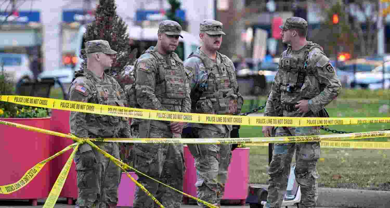 National Guard are seen after reports of two National Guard soldiers shot near the White House in Washington, Wednesday. National Guard are seen after reports of two National Guard soldiers shot near the White House in Washington, Wednesday.