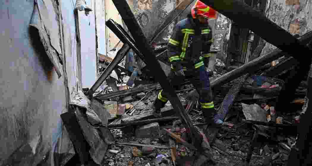 A rescue worker walks inside apartments destroyed by a Russian strike in Odesa, Ukraine, on Monday. A rescue worker walks inside apartments destroyed by a Russian strike in Odesa, Ukraine, on Monday.