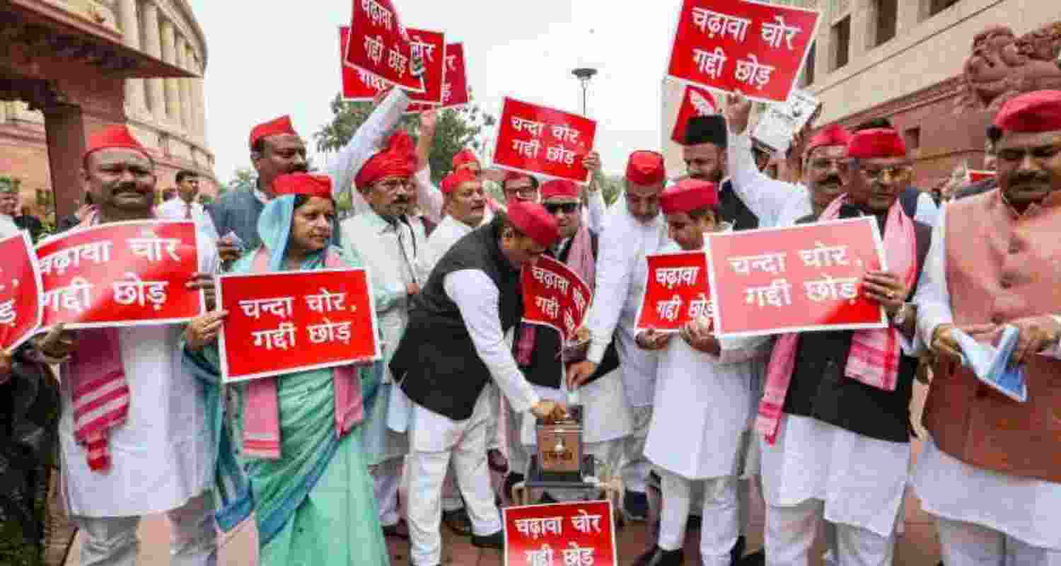 Samajwadi Party MPs holding a protest in the Parliament House complex on Wednesday. Samajwadi Party MPs holding a protest in the Parliament House complex on Wednesday.