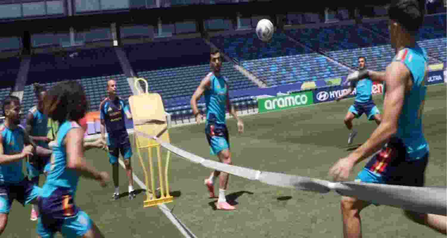 Spain playing a unique fusion of football and tennis during a training session ahead of their last 8 match. Spain playing a unique fusion of football and tennis during a training session ahead of their last 8 match.