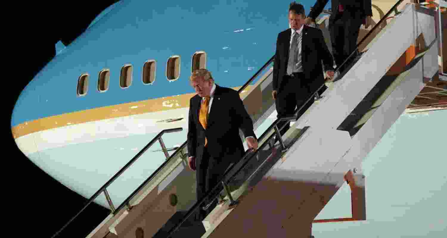 US President Donald Trump switches planes at US Air Force Base, RAF Mildenhall, England on his way back to Washington from the NATO summit in Ankara, Turkey. US President Donald Trump switches planes at US Air Force Base, RAF Mildenhall, England on his way back to Washington from the NATO summit in Ankara, Turkey.